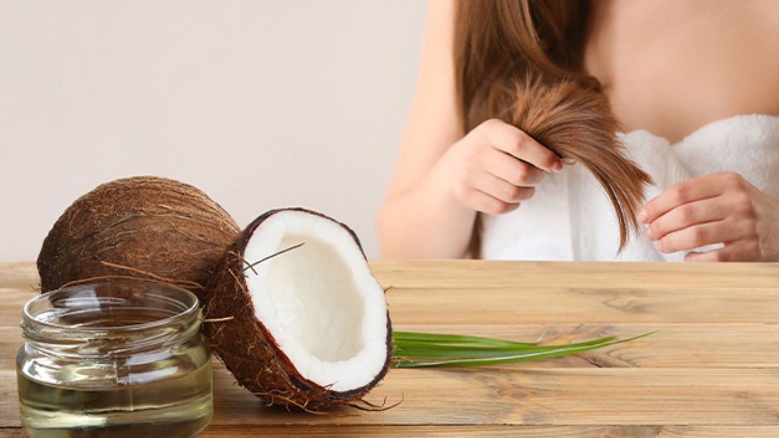 Coconut oil for dry scalp (Image via Getty Images)