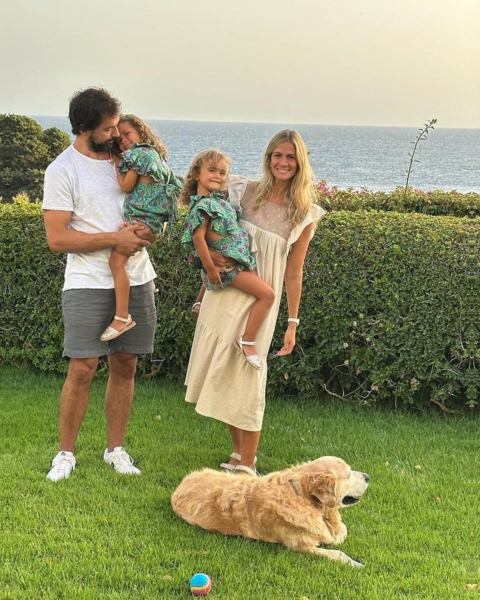 Sergio Llull and Almudena Canovas with their children