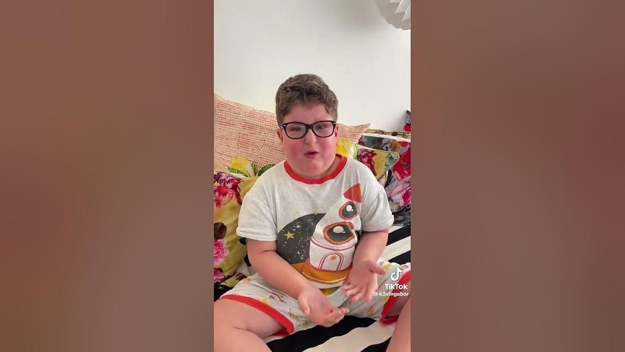 Social media users shower support as child TikToker posts video claiming people are reporting his account because of his disability. (Image via K3vingabor)