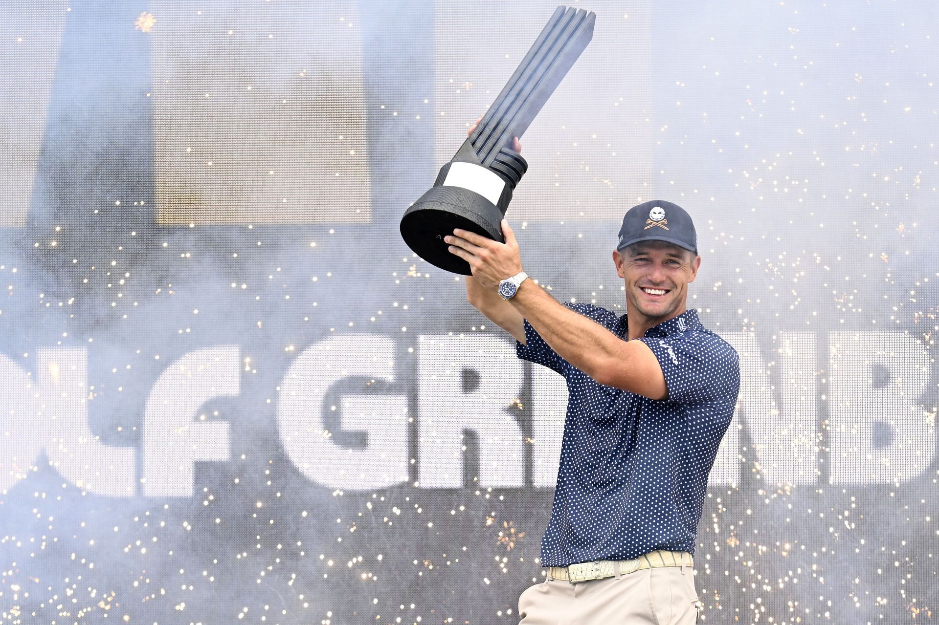Bryson DeChambeau poses with the trophy after winning the LIV Golf Greenbrier