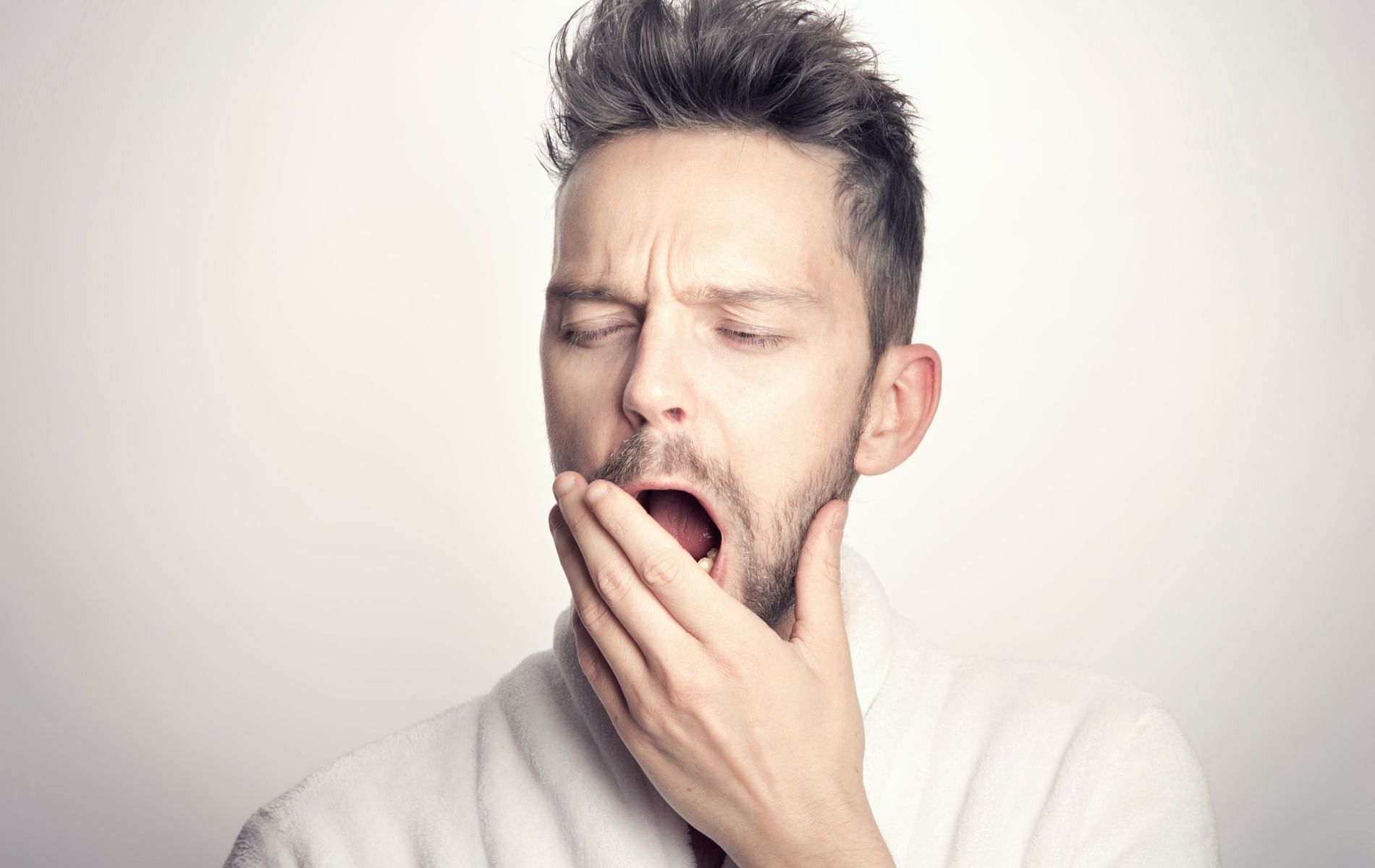 Yawning or oscitation occurs to make our system more alert. (Image via Pexels)