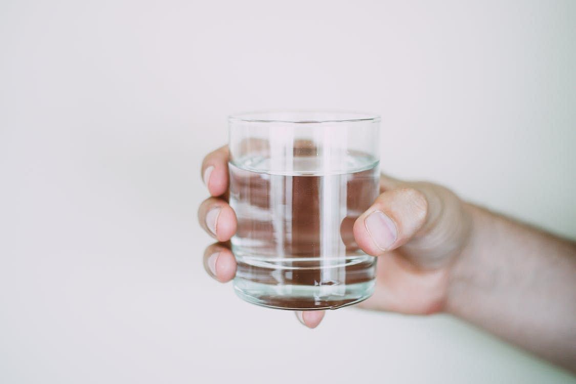 The study looked at the effects of drinking water while standing up straight. (Lisa Fotios/ Pexels)