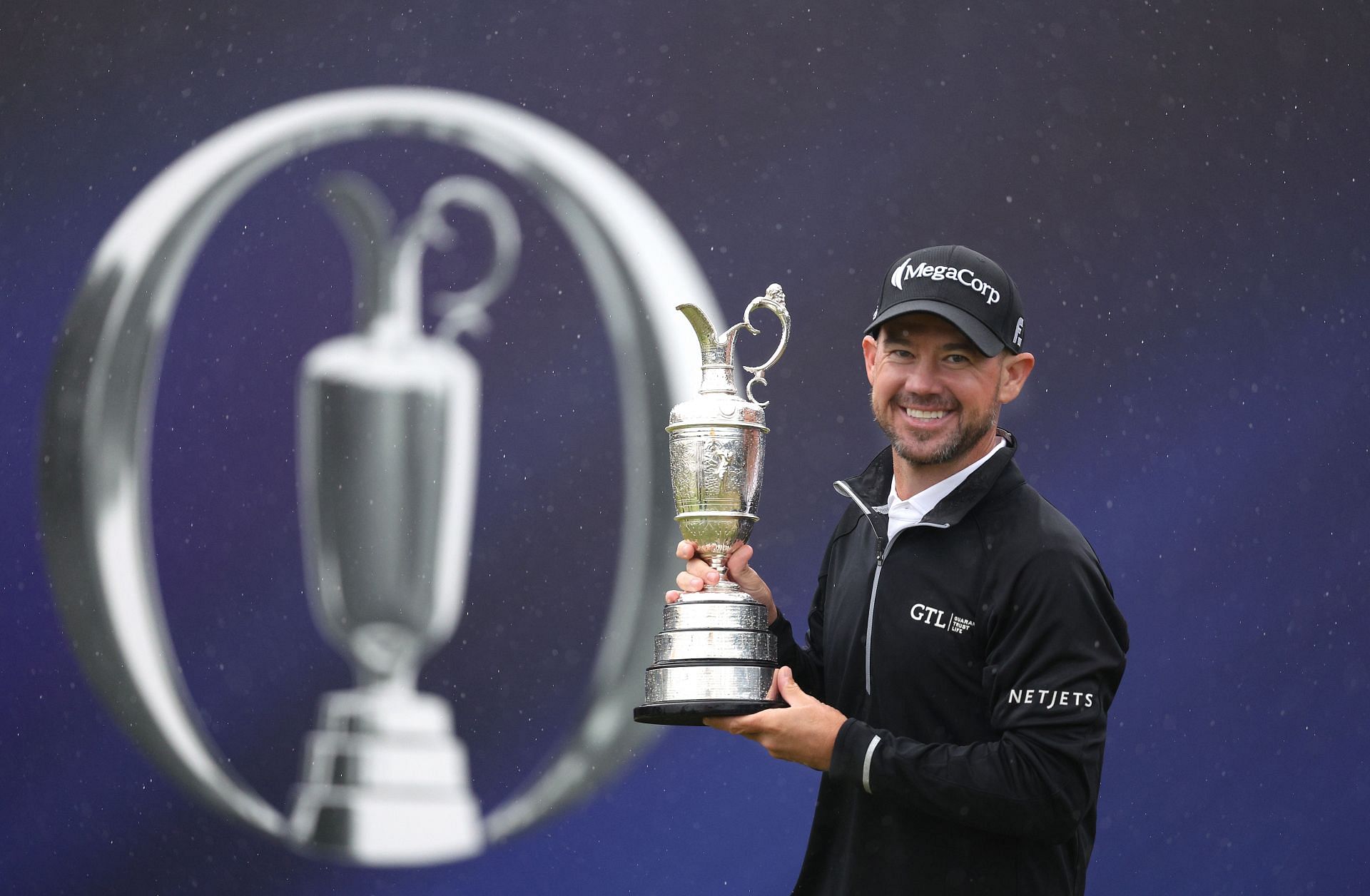 Brian Harman with the Claret Jug at the 2023 Open Championship (via Getty Images)