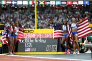 Gold medalists Gabrielle Thomas, Tamari Davis, Twanisha Terry, and Sha'Carri Richardson of Team United States celebrate wth their new championship record after winning the Women's 4x100m Relay Final during day eight of the World Athletics Championships Budapest 2023