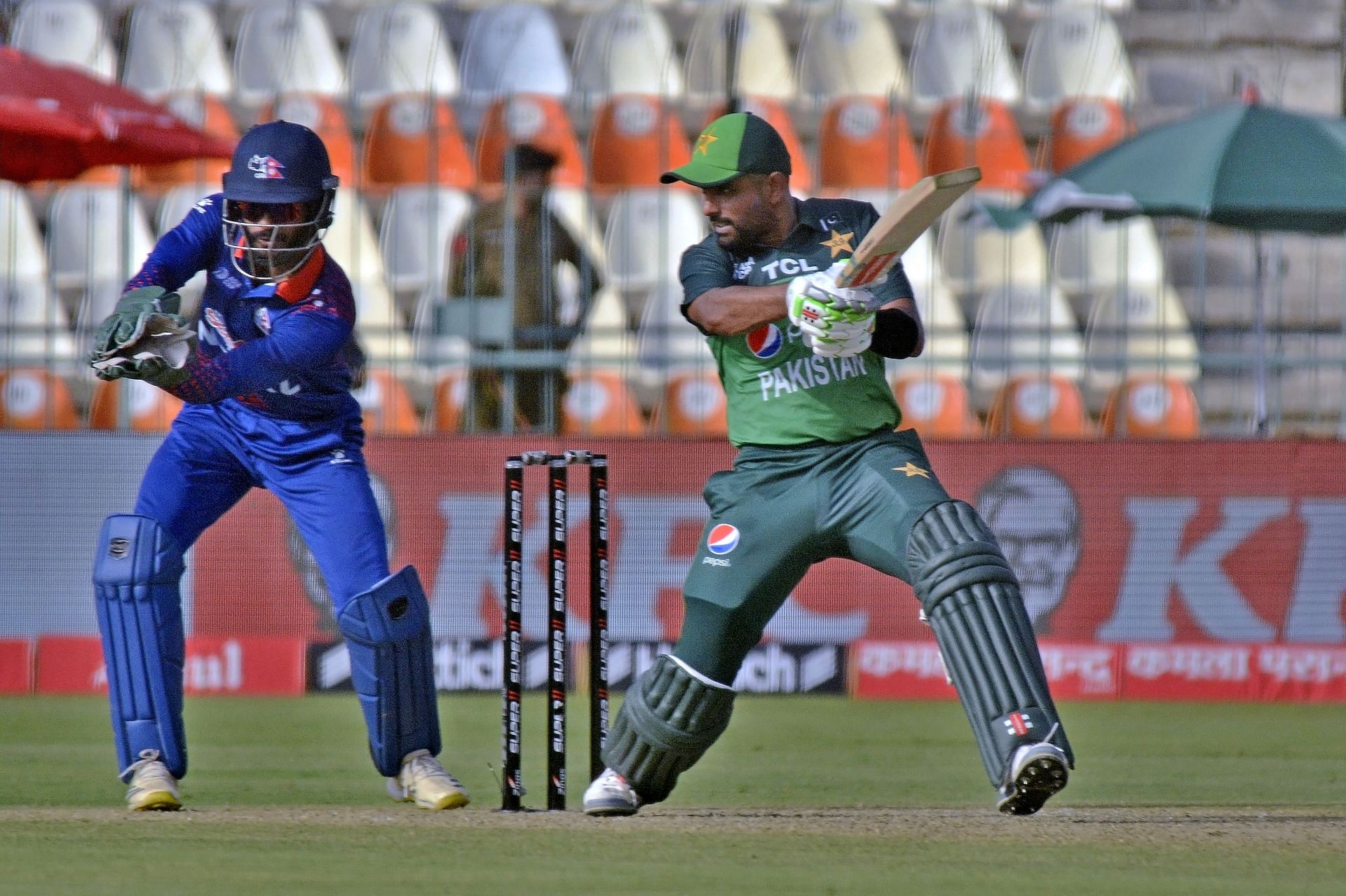 Babar Azam playing a cut shot vs Nepal [Getty Images]