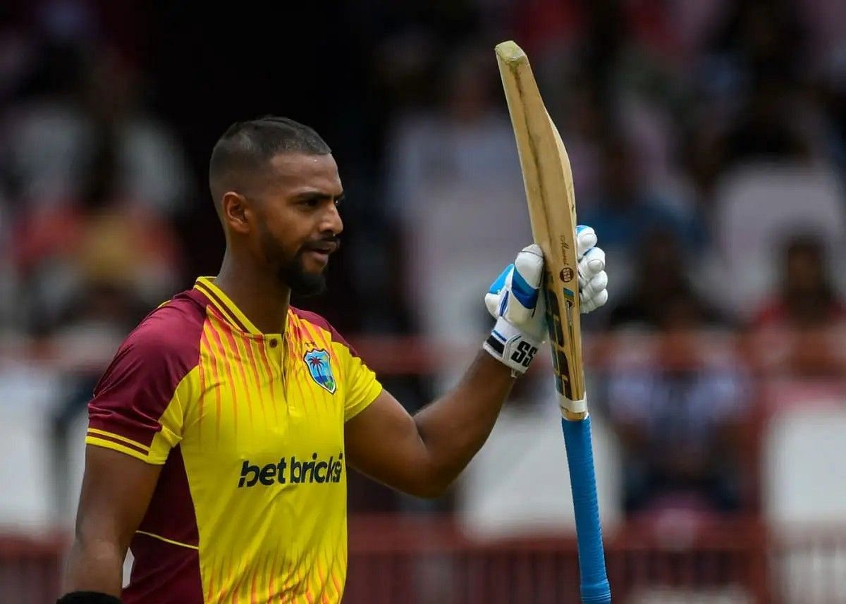 Nicholas Pooran raising his bat after a fifty [Getty Images]