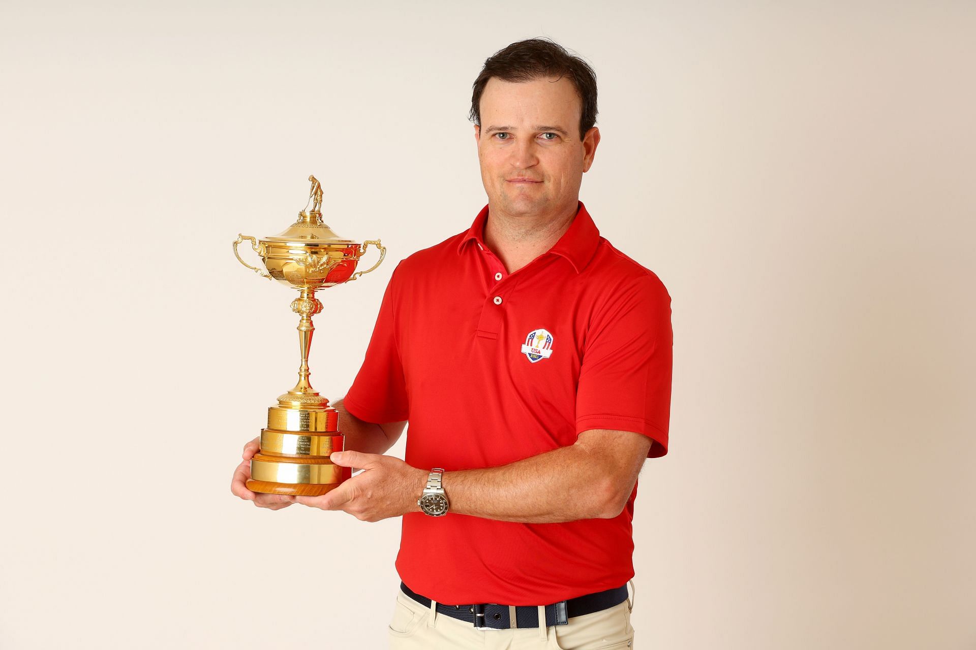 Team USA captain Zach Johnson poses with 2023 Ryder Cup trophy (Image via Getty)