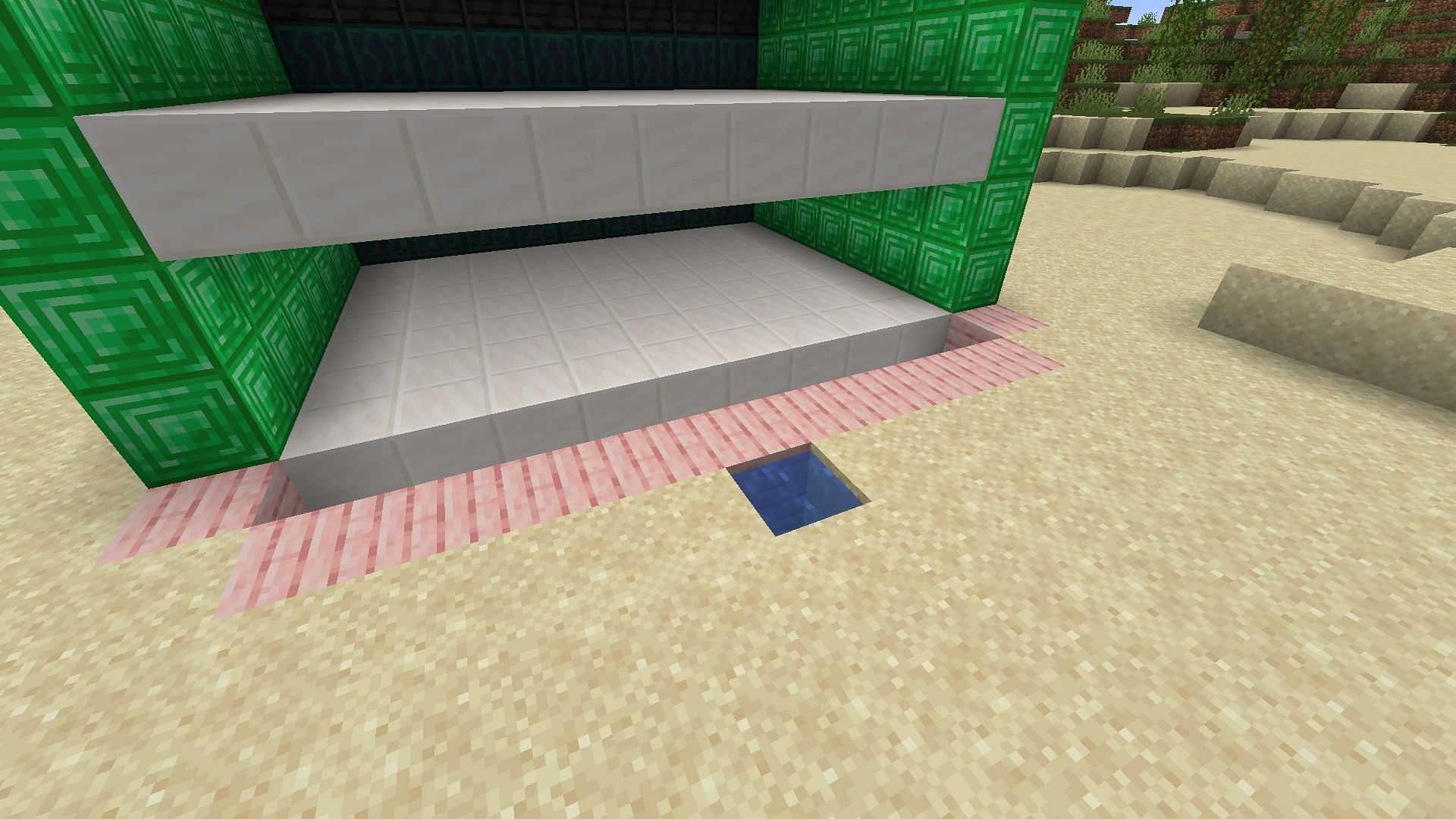 The water entryway from the surface level of this Minecraft build (Image via Mojang)