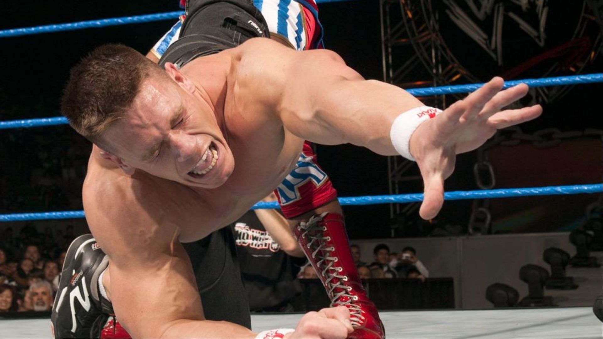 John Cena struggles to get out of submission