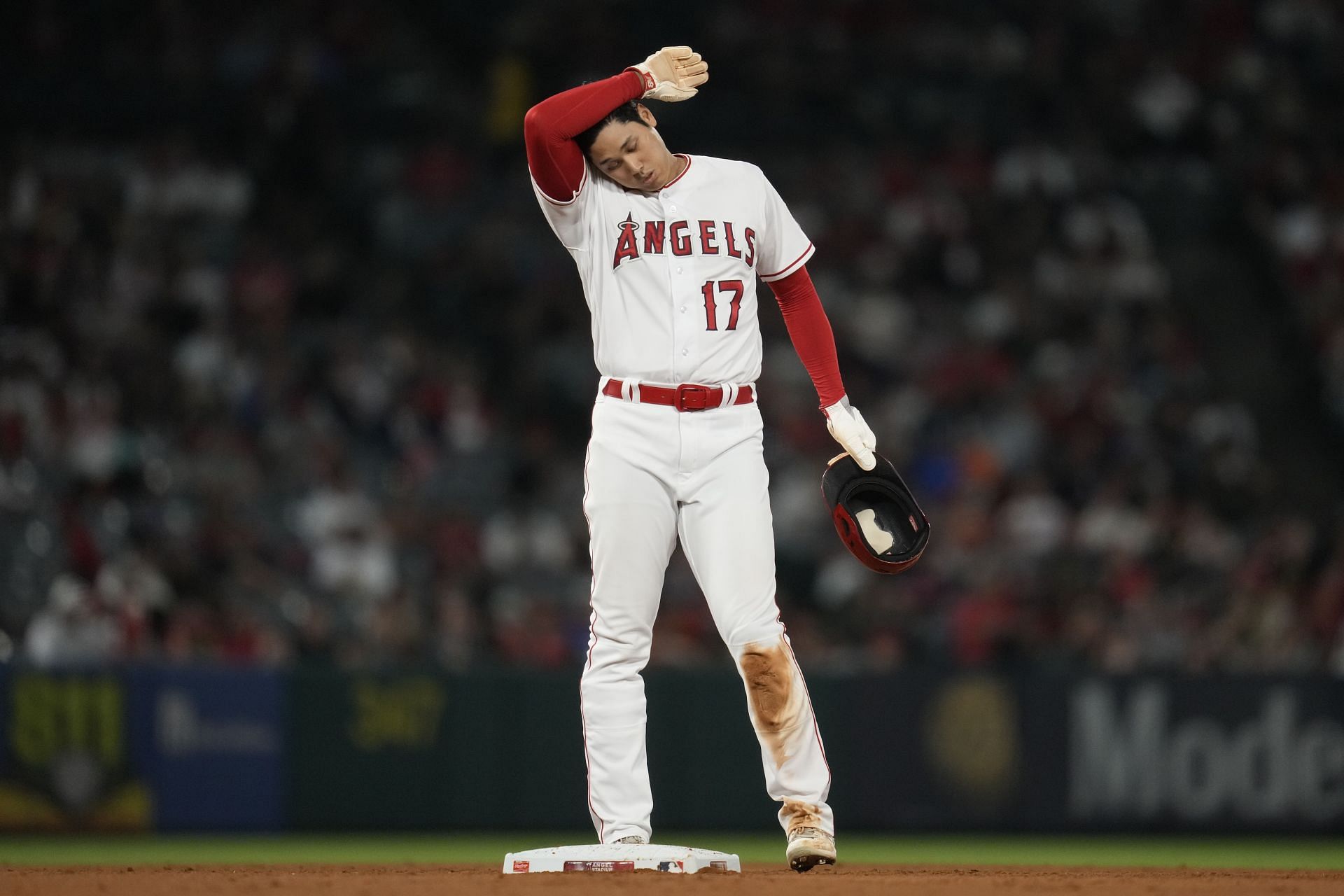 Los Angeles Angels designated hitter Shohei Ohtani (17) stands on second base during the sixth inning of a baseball game against the San Francisco Giants in Anaheim, Calif., Monday, Aug. 7, 2023. (AP Photo/Ashley Landis)