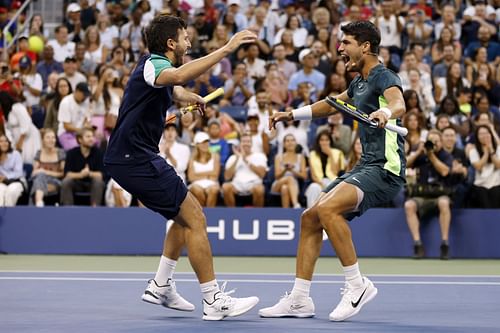 Sebastian Yatra (L) and Carlos Alcaraz celebrate.