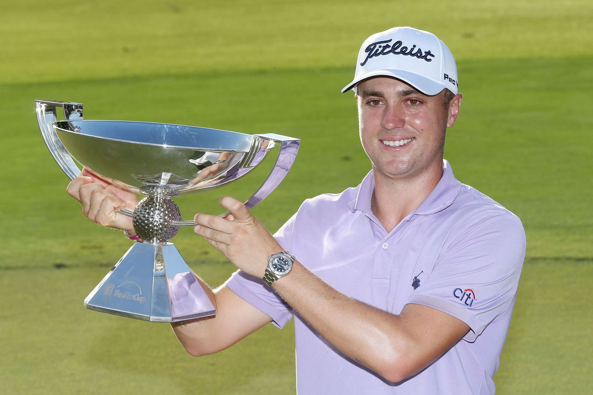 Justin Thomas poses with the trophy after winning the 2017 Playoffs