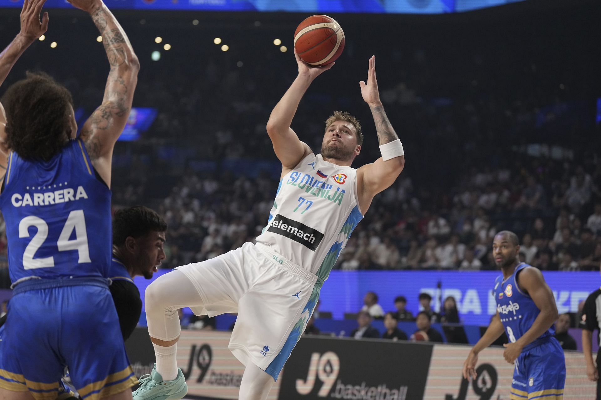 Slovenia guard Luka Doncic shoots against Venezuela in the 2023 FIBA World Cup