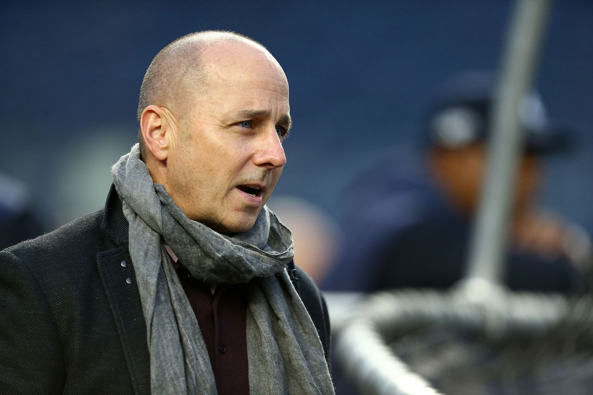 New York Yankees General Manager Brian Cashman looks on during batting practice at Yankee Stadium