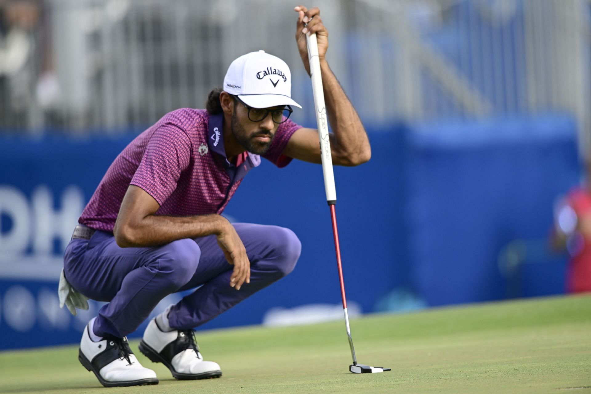 Akshay Bhatia lines up a putt during the second round of the 2023 Wyndham Championship