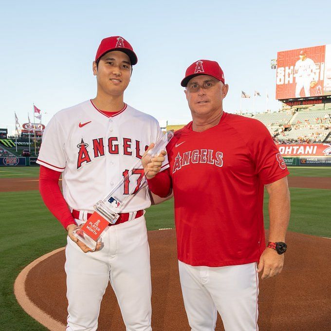 In Photos: Shohei Ohtani poses with manager Phil Nevin after receiving A.L.  Player of the Month honors