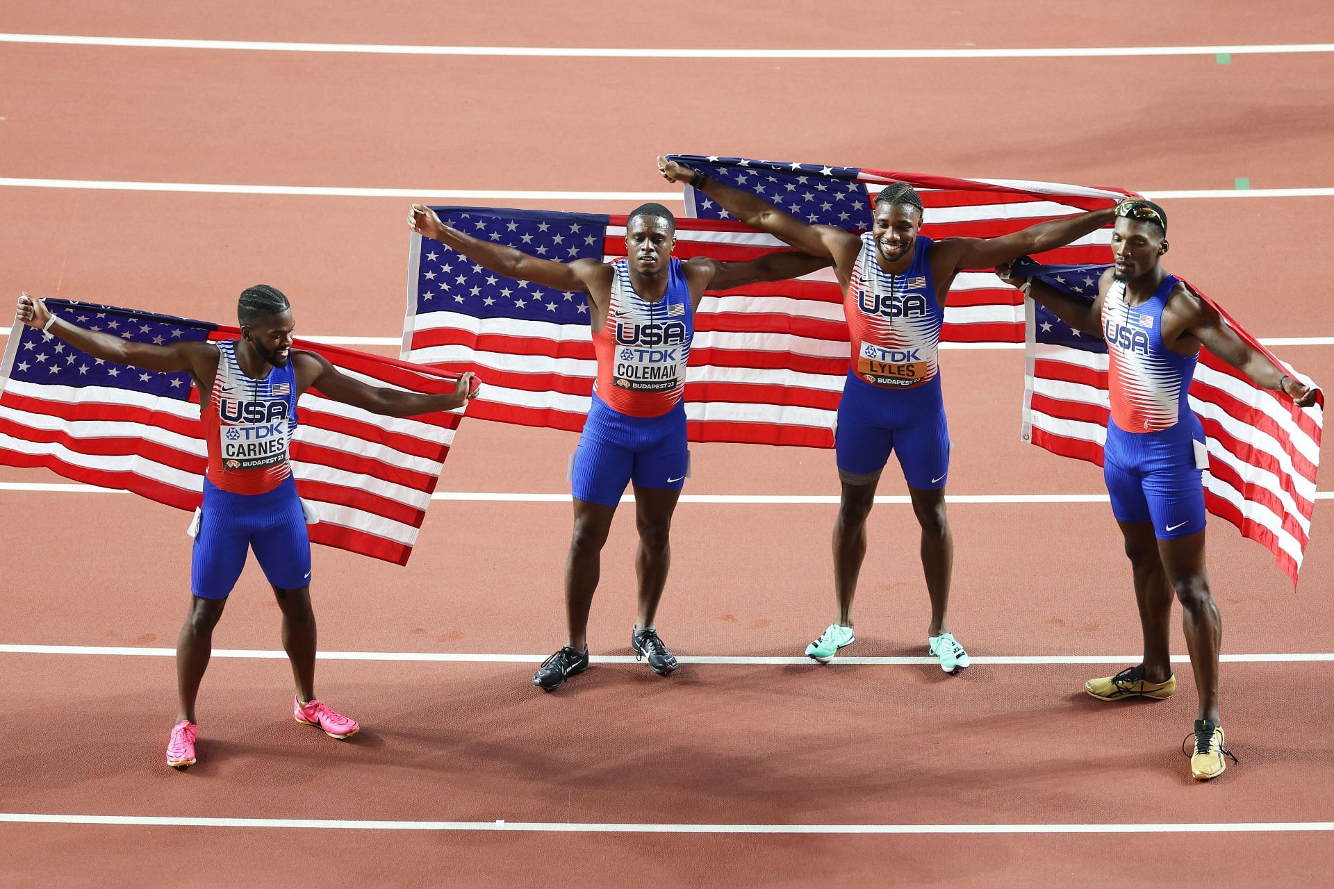 (L to R) Brandon Carnes, Christian Coleman, Noah Lyles and Fred Kerley of Team United States celebrate winning gold in the Men&#039;s 4x100m Relay Final during day eight of the World Athletics Championships Budapest 2023