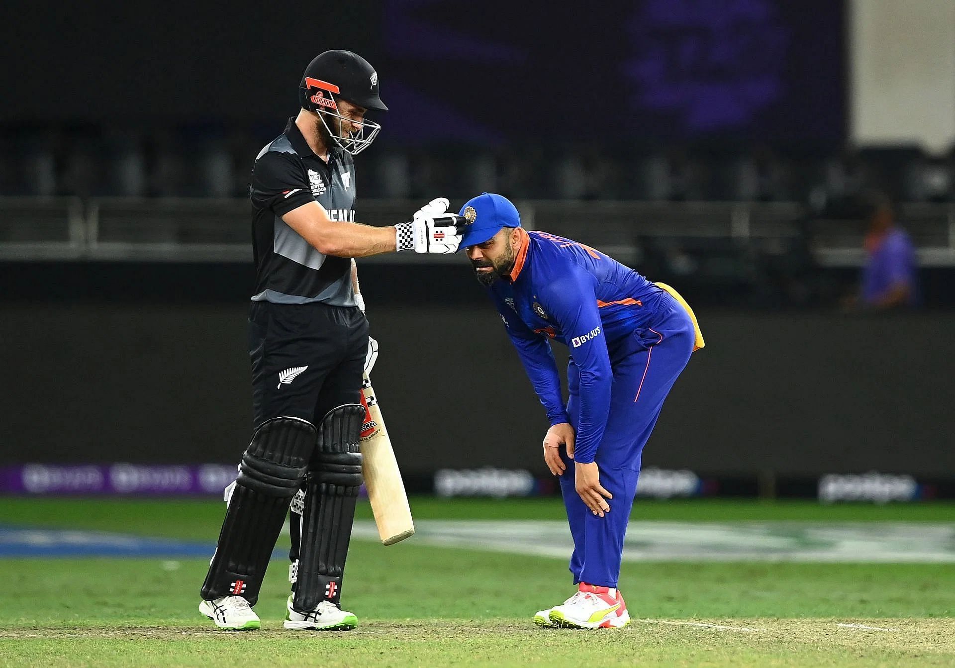 The Kiwi batter consoles friend Virat Kohli after the 2021 T20 World Cup match. (Pic: Getty Images)