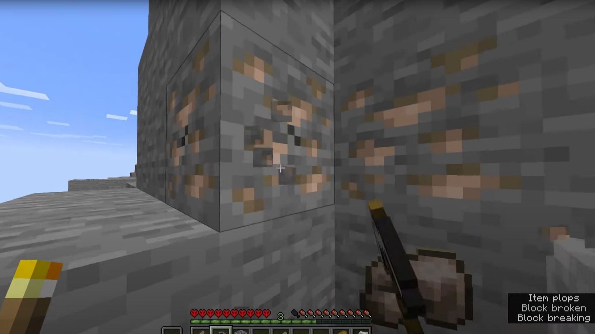 Mining iron in Minecraft (Image via Mojang Studios)