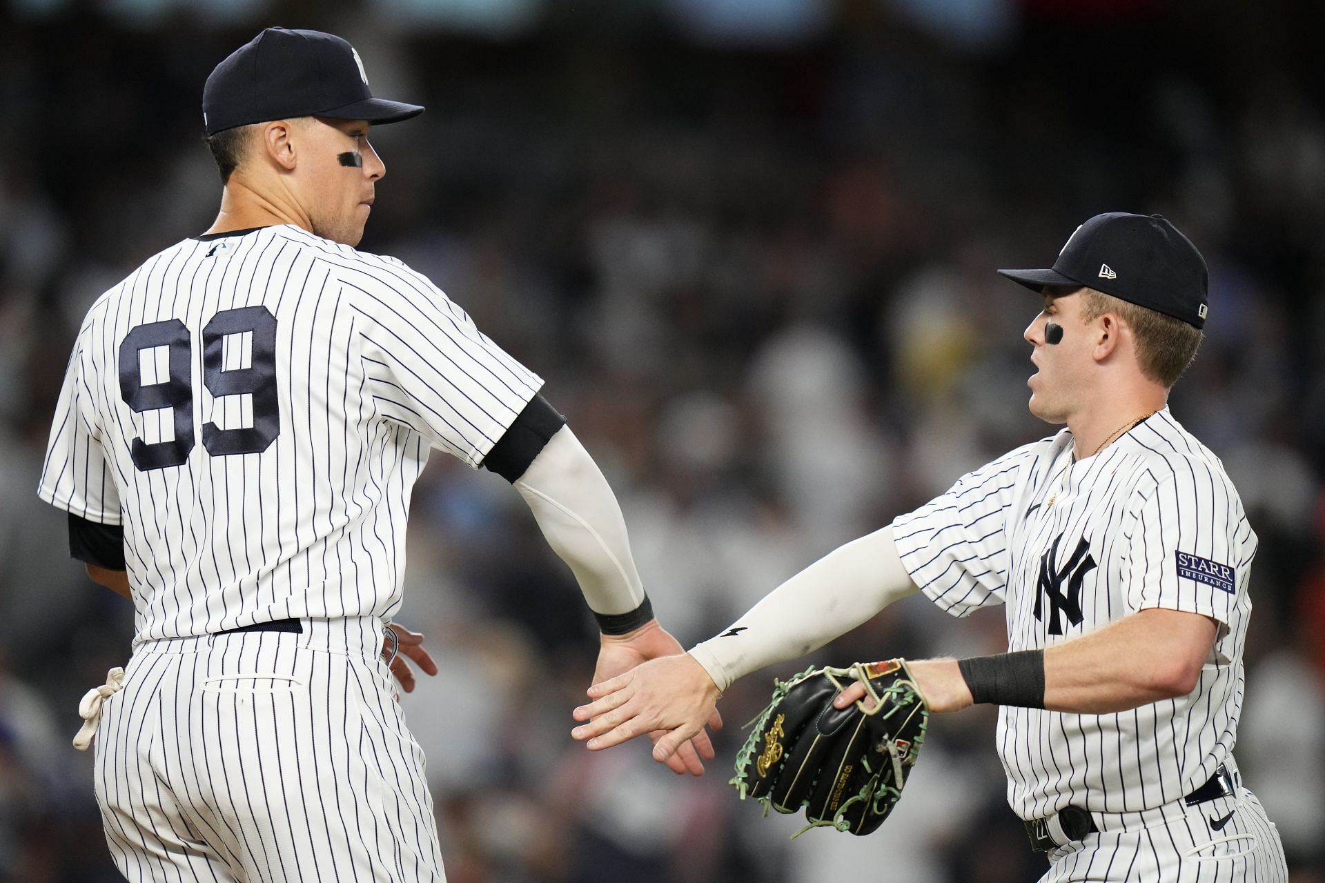 Aaron Judge celebrates with Harrison Bader after the team&#039;s win against the Houston Astros in New York