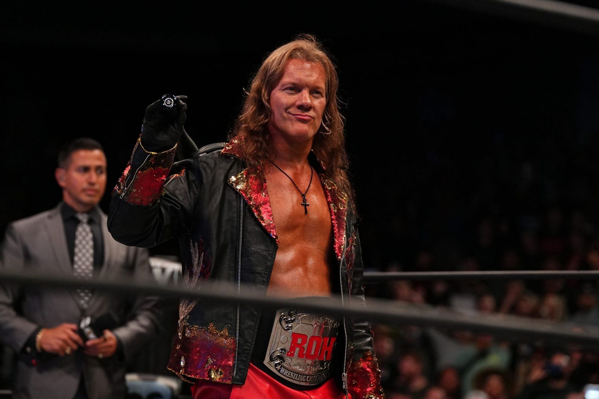Chris Jericho with the ROH Championship.
