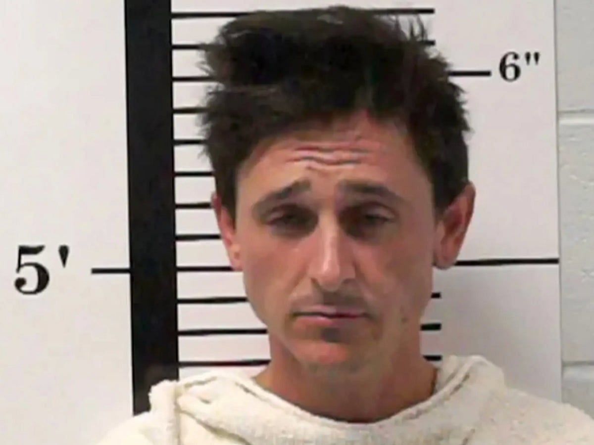 A mugshot of Mitchel Musso after his arrest (image via The Independent)