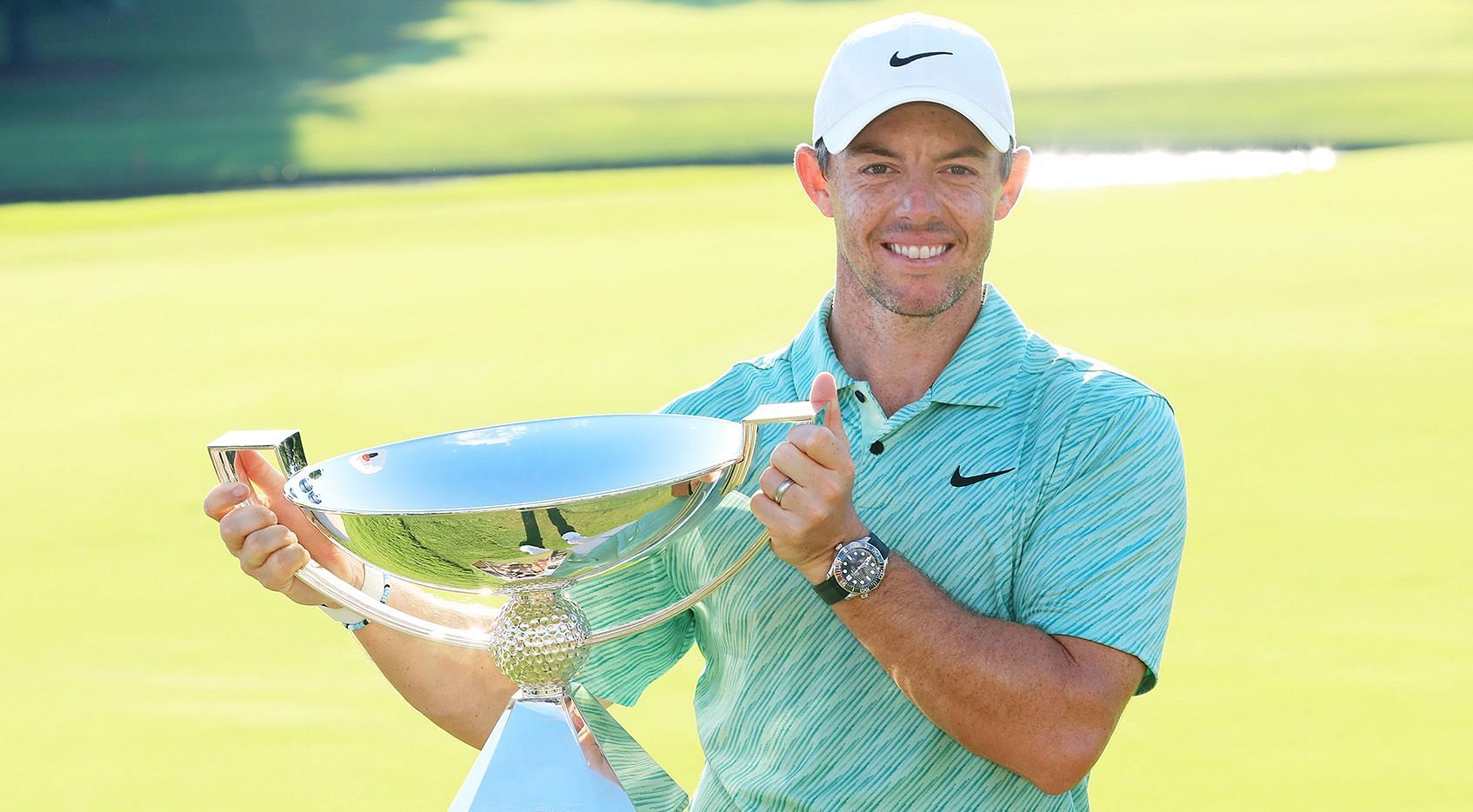 Rory McIlroy with the 2022 TOUR Championship trophy (via PGA)