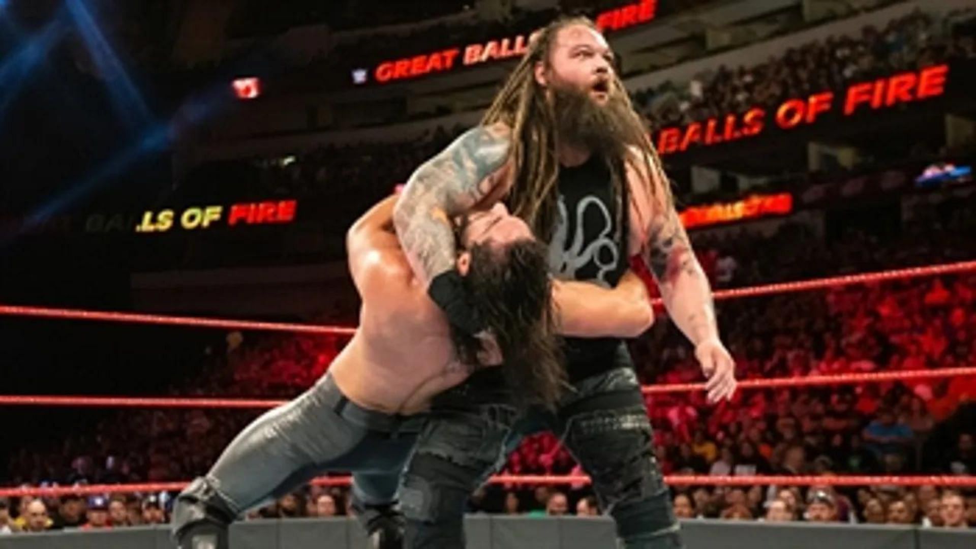 Bray Wyatt and Seth Rollins during a match