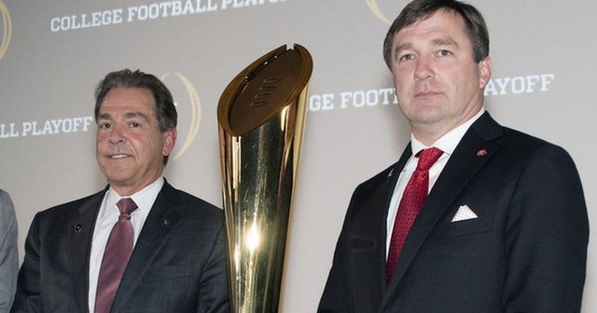 Nick Saban, of Alabama, left, and Kirby Smart, right, of Georgia pose together before the College Football Awards show at the College Football Hall of Fame, Thursday, Dec. 7, 2017, in Atlanta. (AP Photo/John Amis)
