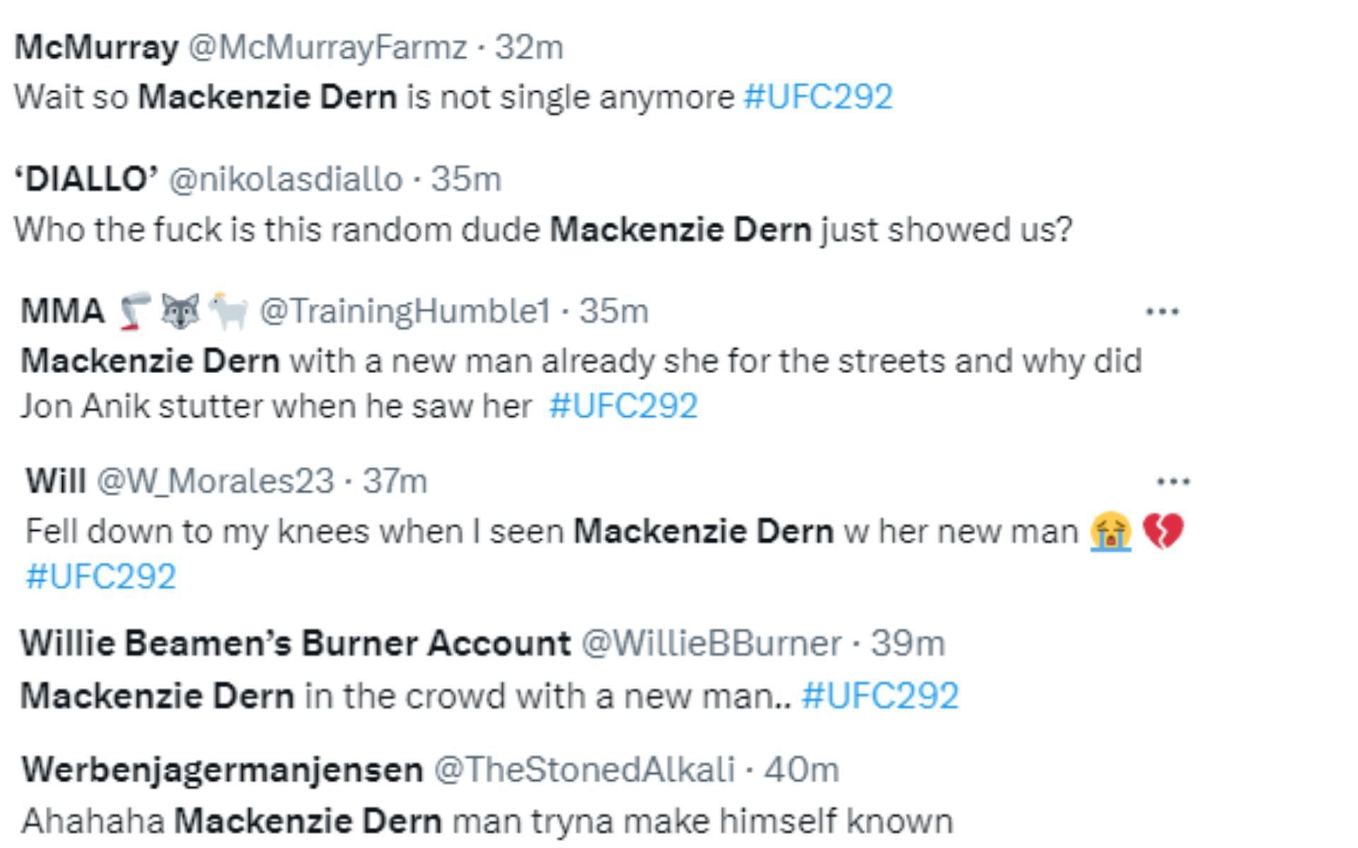 MMA fans react to the visuals of Dern accompanied by a man at UFC 292