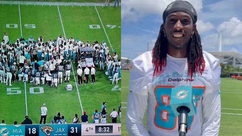 Daewood Davis of Dolphins carted off field after collision