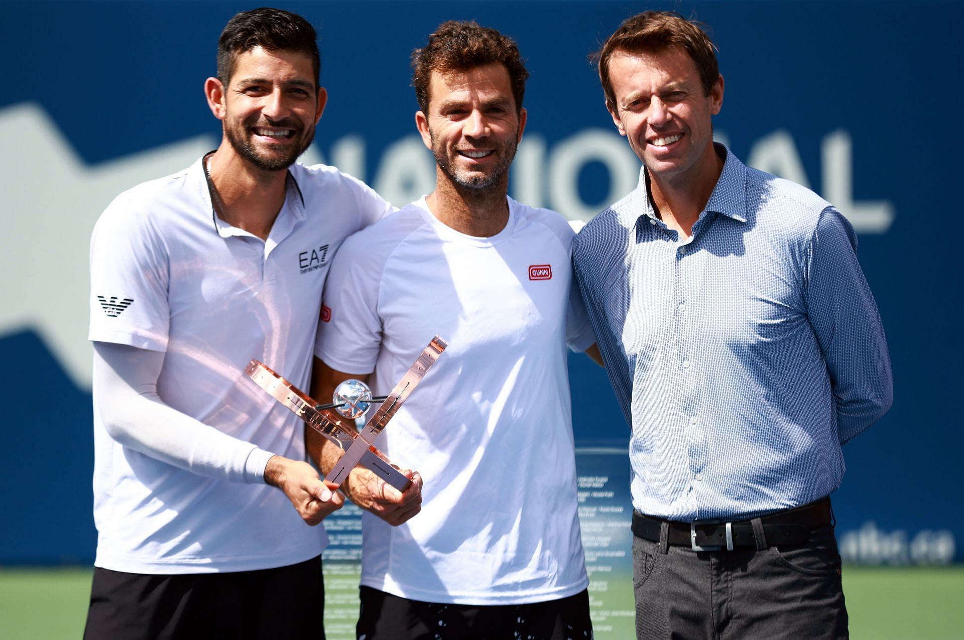 Marcelo Arevalo and Jean-Julien Rojer with Daniel Nestor