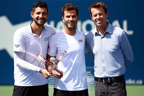 Marcelo Arevalo and Jean-Julien Rojer with Daniel Nestor