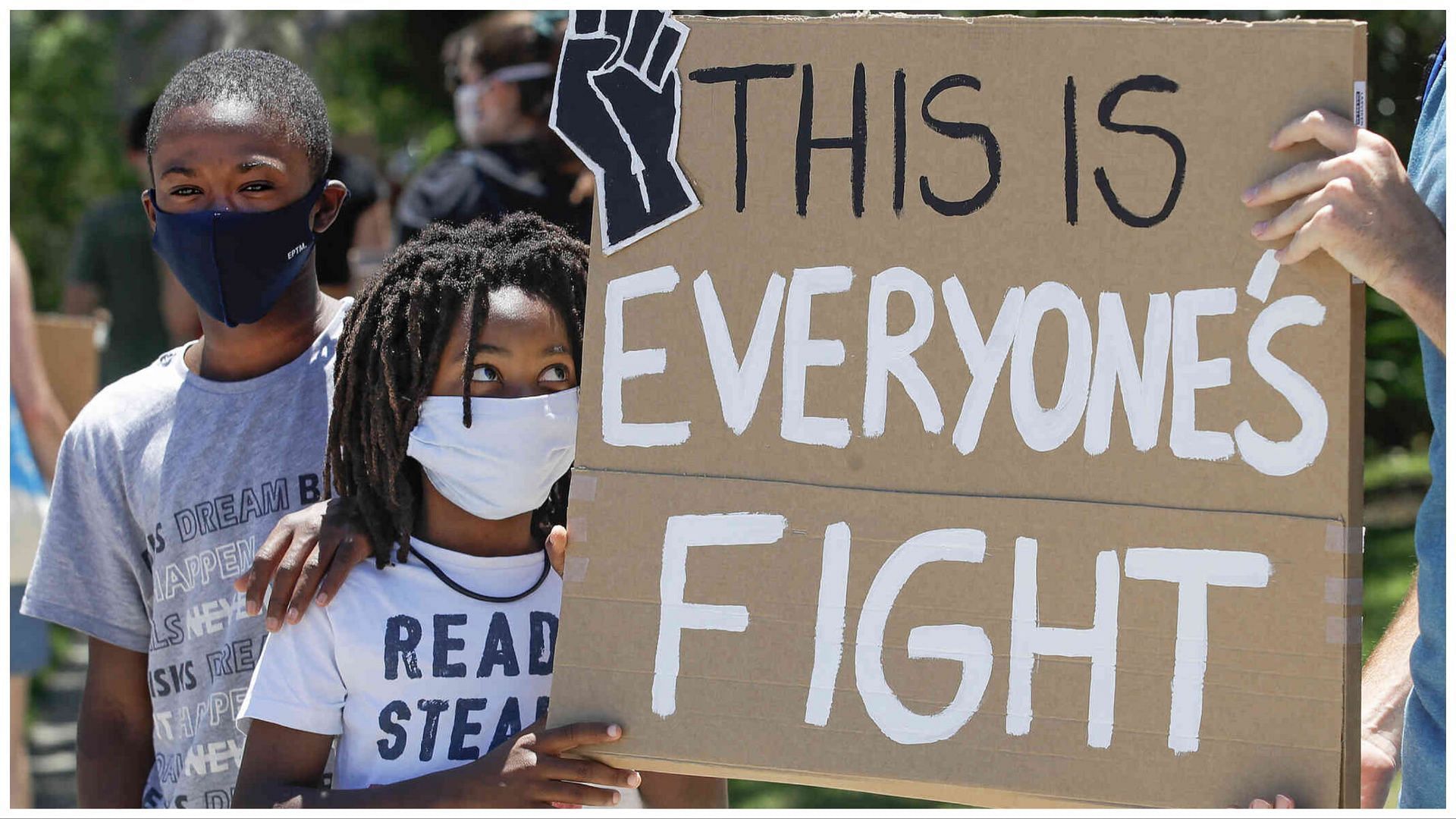 Students of America fighting against racism (Image via Associated Press)