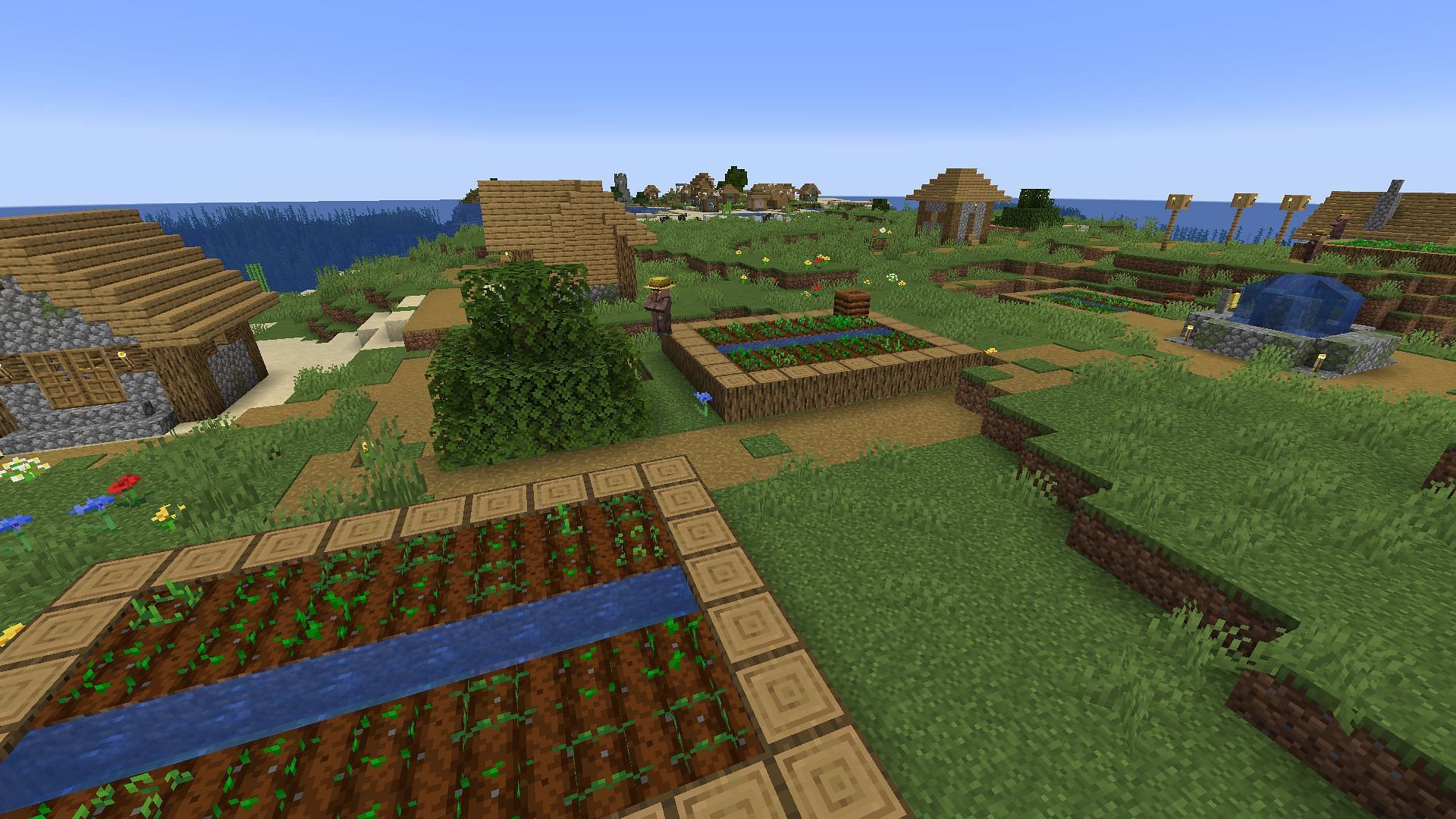 Both a standard village and an abandoned village lie in wait in this Minecraft island seed (Image via Mojang)