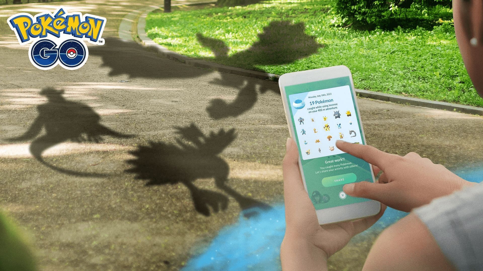 A player enjoys Pokemon GO as the shadows of Galarian Articuno, Moltres, and Zapdos loom nearby.