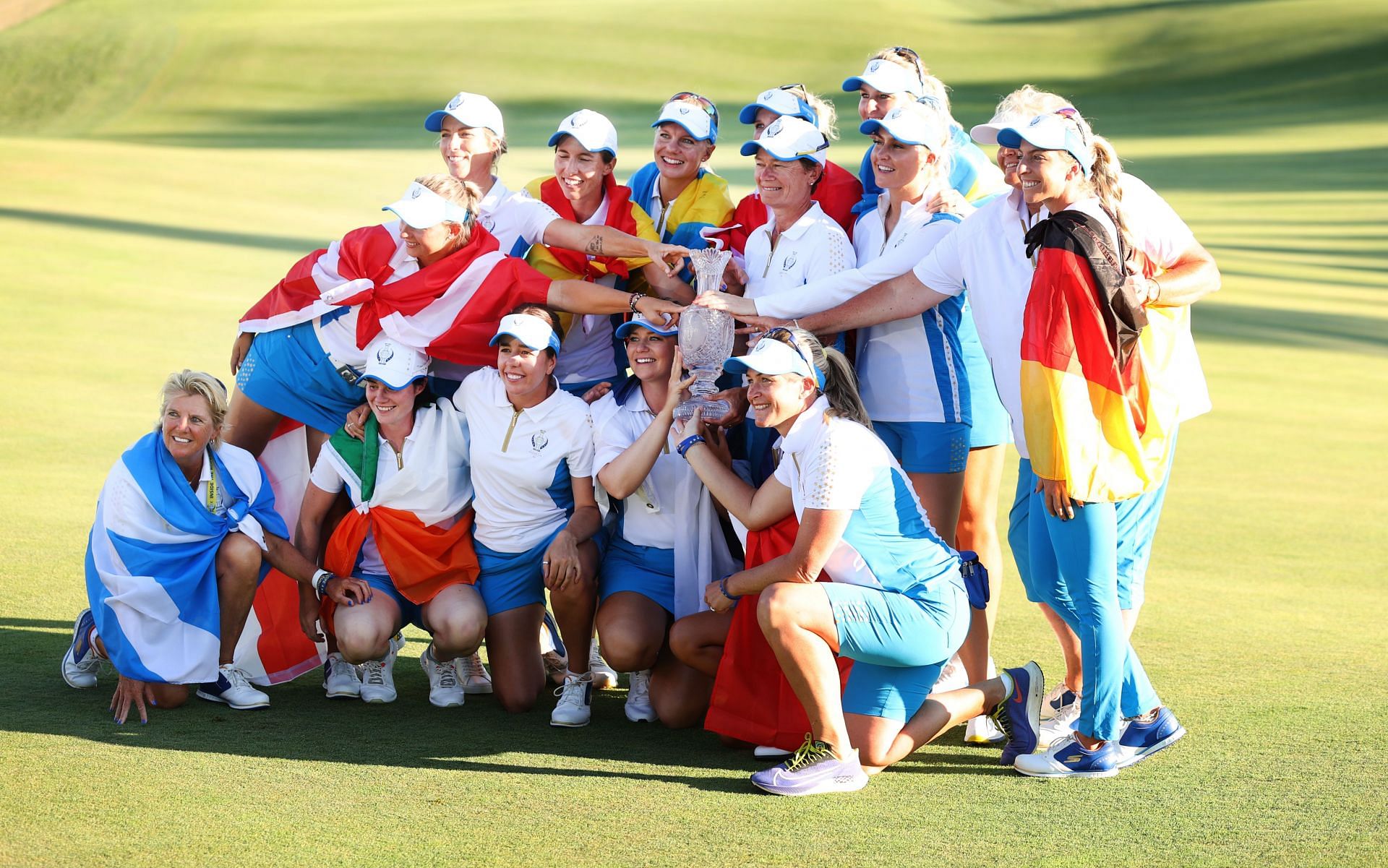 Team Europe poses with the Solheim Cup after winning the 2021 Solheim Cup