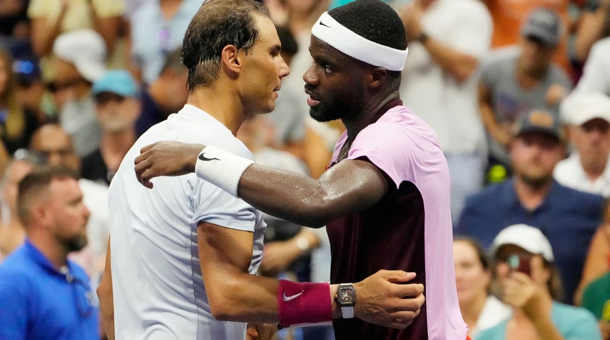 Frances Tiafoe greets Rafael Nadal after beating him at the 2022 US Open