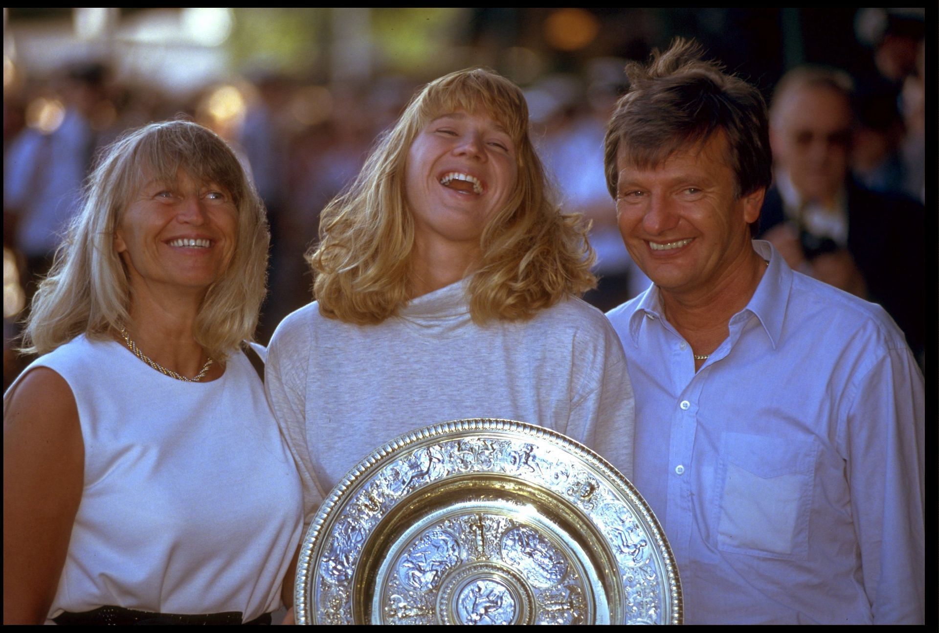 Steffi Graf flanked by her parents following the 1991 Wimbledon triumph