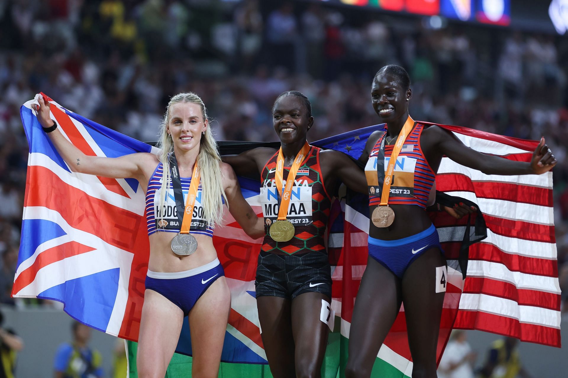Silver medalist Keely Hodgkinson of Team Great Britain, gold medalist Mary Moraa of Team Kenya and bronze medalist Athing Mu of Team United States during Day 9 of the 2023 World Athletics Championships 