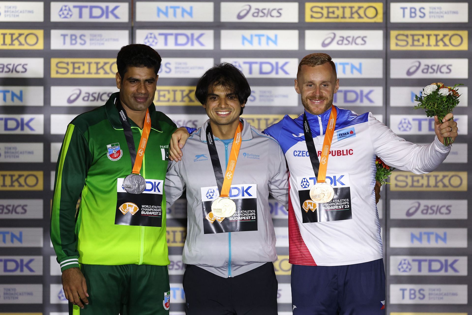 Silver medalist Arshad Nadeem of Team Pakistan, gold medalist Neeraj Chopra of Team India, and bronze medalist Jakub Vadlejch of Team Czech Republic during Day 9 of the 2023 World Athletics Championships 