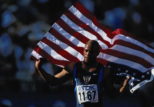 Maurice Greene after winning the men's 100m at the 8th IAAF World Championships in Athletics in Canada