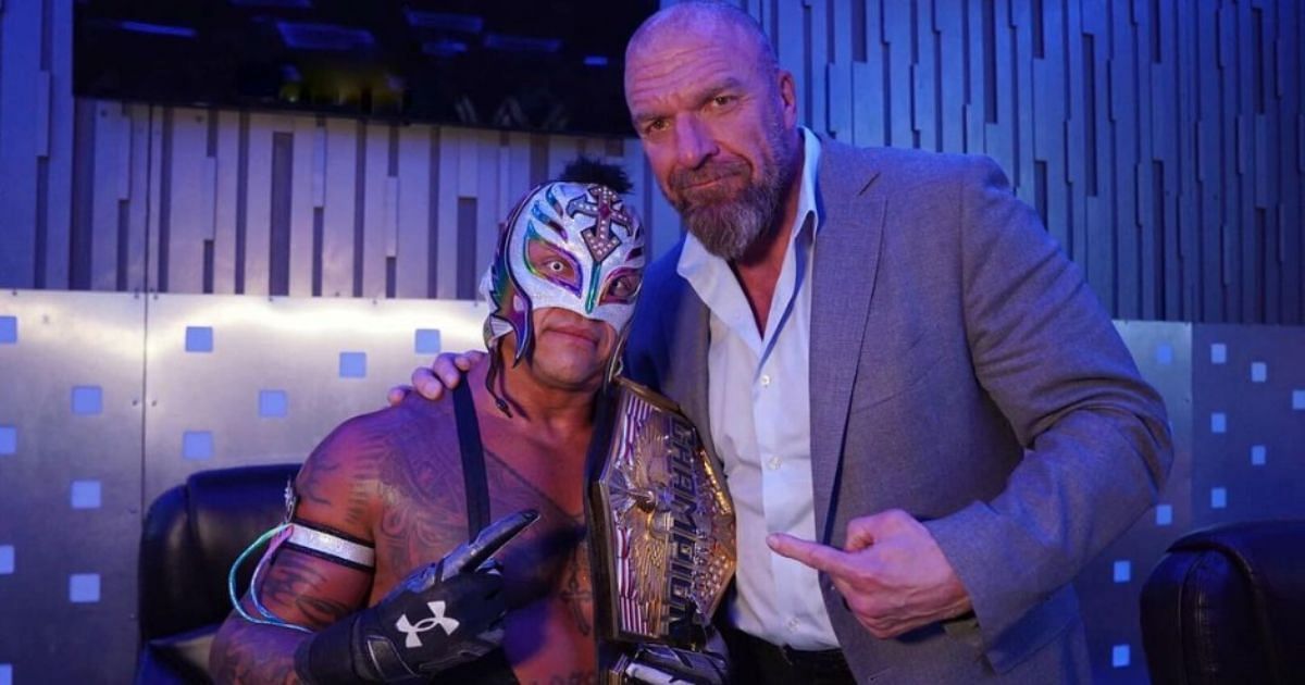 Rey Mysterio and Triple H backstage on SmackDown.