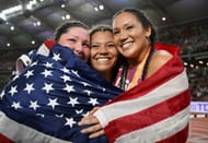 Bronze medalist Deanna Price of Team United States, gold medalist Camryn Rogers of Team Canada and silver medalist Janee' Kassanavoid of Team United States react after winning the Women's Hammer Throw Final during Day 6 of the World Athletics Championships Budapest 2023