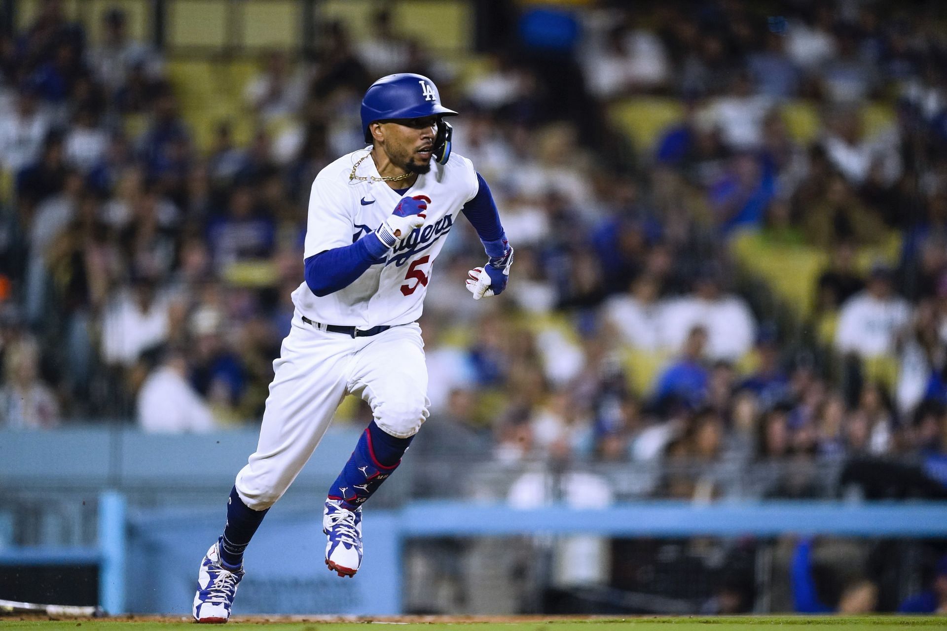 Los Angeles Dodgers&#039; Mookie Betts runs after hitting a single against the Milwaukee Brewers during the fourth inning of a baseball game Tuesday, Aug. 15, 2023, in Los Angeles. (AP Photo/Ryan Sun)