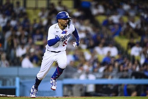 Los Angeles Dodgers' Mookie Betts runs after hitting a single against the Milwaukee Brewers during the fourth inning of a baseball game Tuesday, Aug. 15, 2023, in Los Angeles. (AP Photo/Ryan Sun)