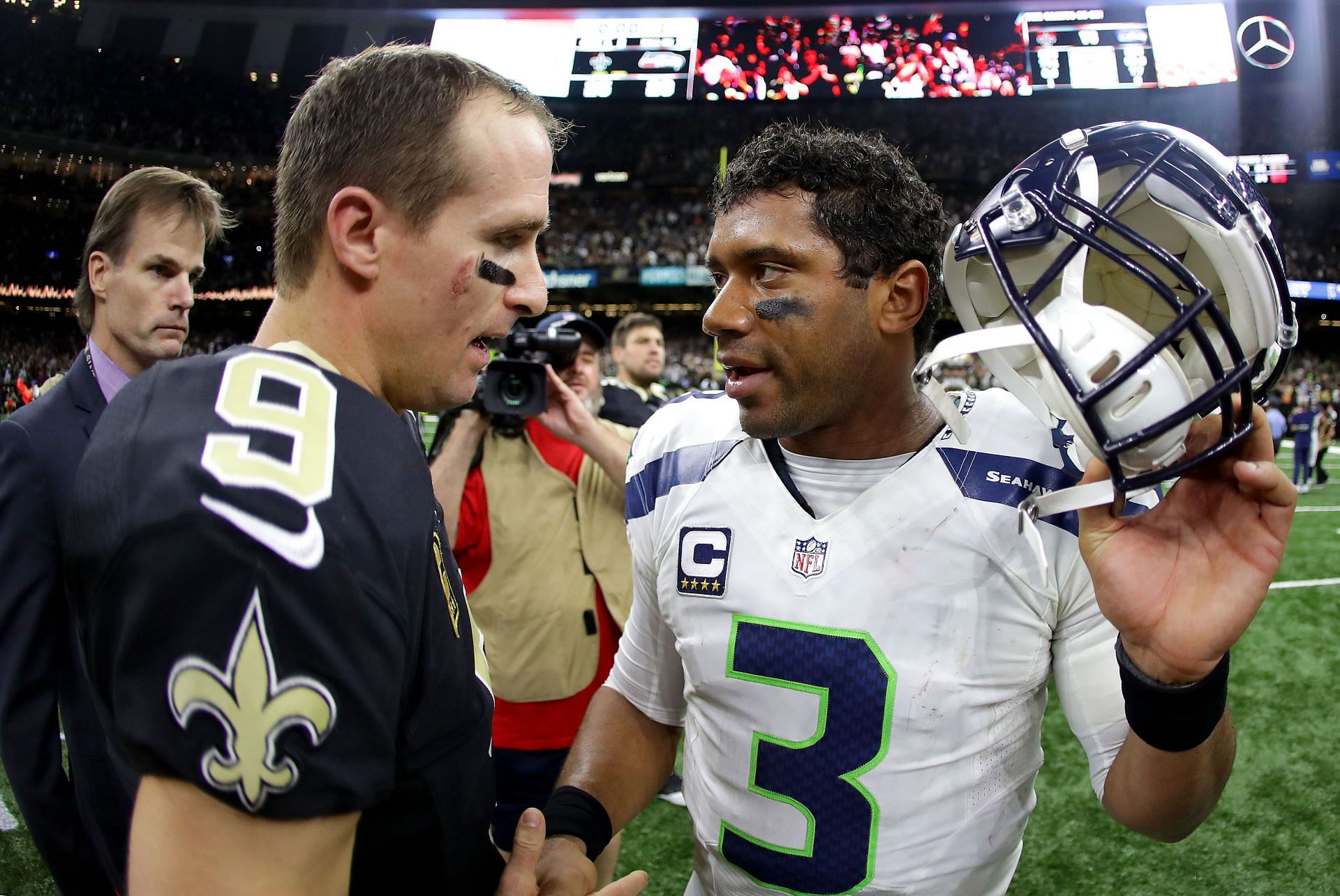 Russell Wilson, Drew Brees during Seattle Seahawks v New Orleans Saints