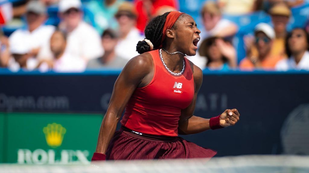 Coco Gauff celebrates after finally beating Iga Swiatek in Cincinnati for the first time in her career