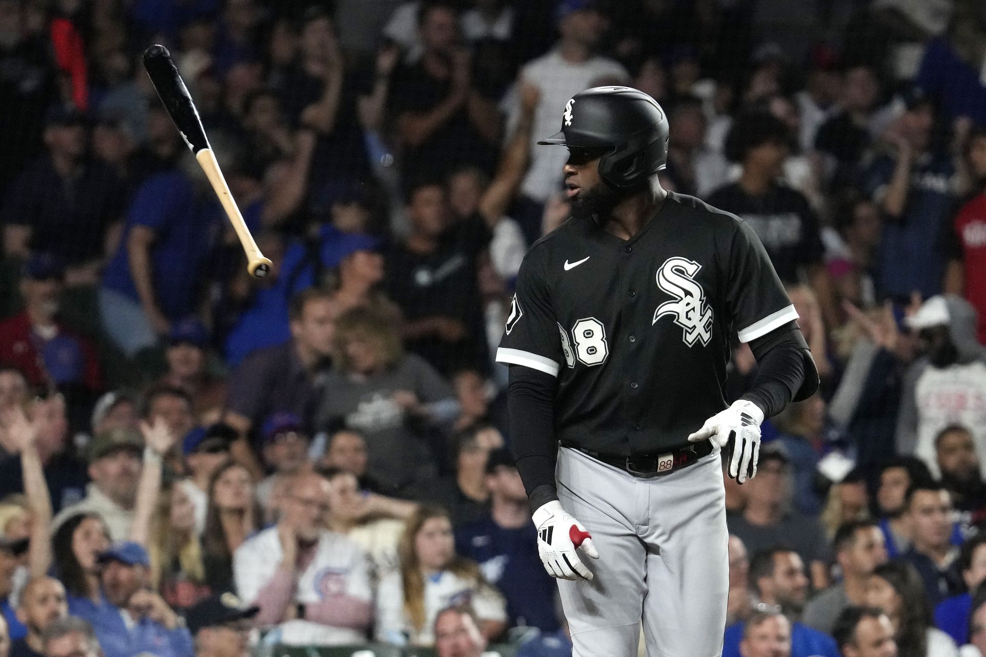 Chicago White Sox&#039;s Luis Robert Jr. flips his bat after hitting a solo home run against the Chicago Cubs during the seventh inning of a baseball game in Chicago, Tuesday, Aug. 15, 2023. (AP Photo/Nam Y. Huh)