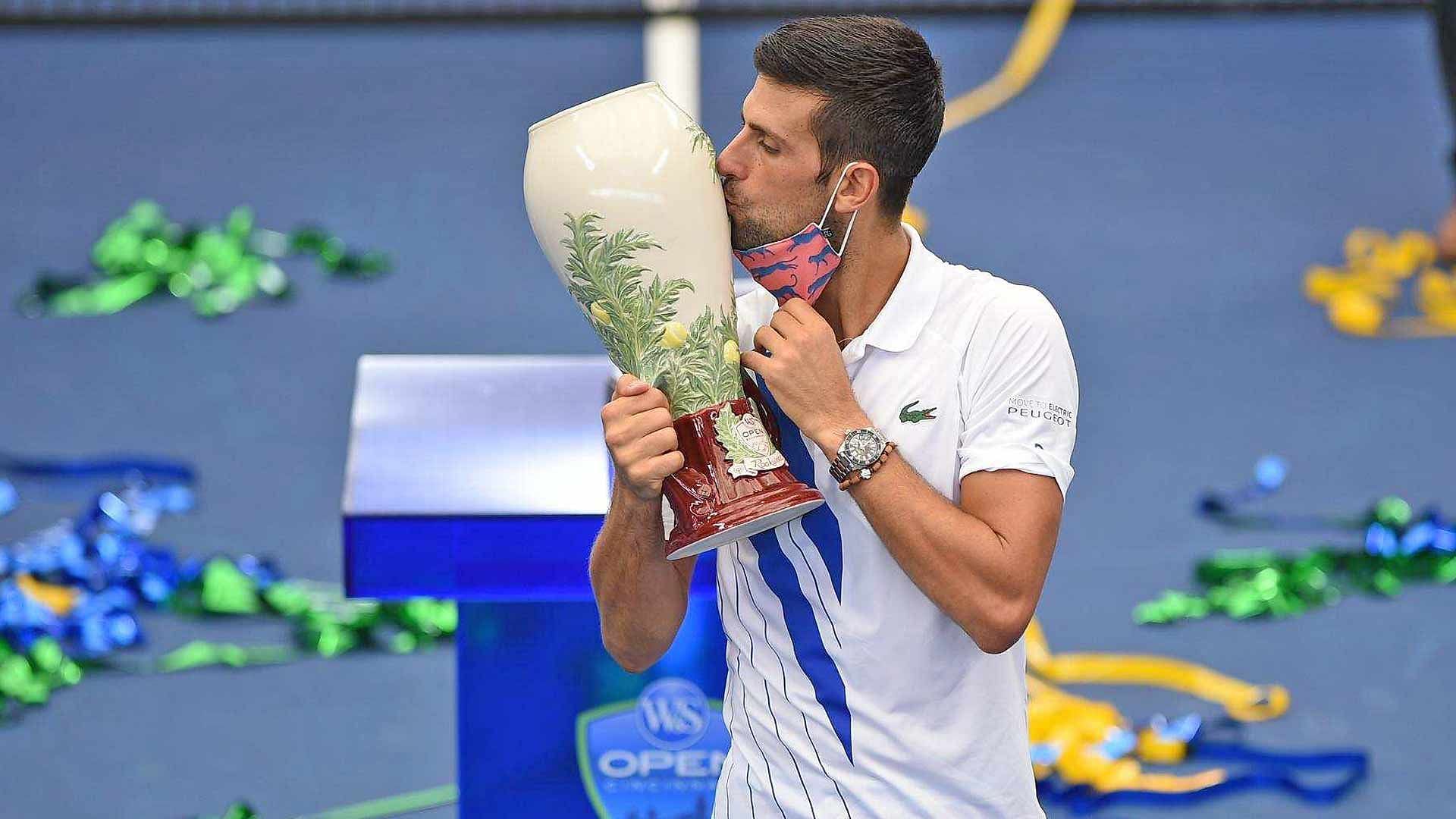 Novak Djokovic poses with the 2020 Cincinnati Masters trophy